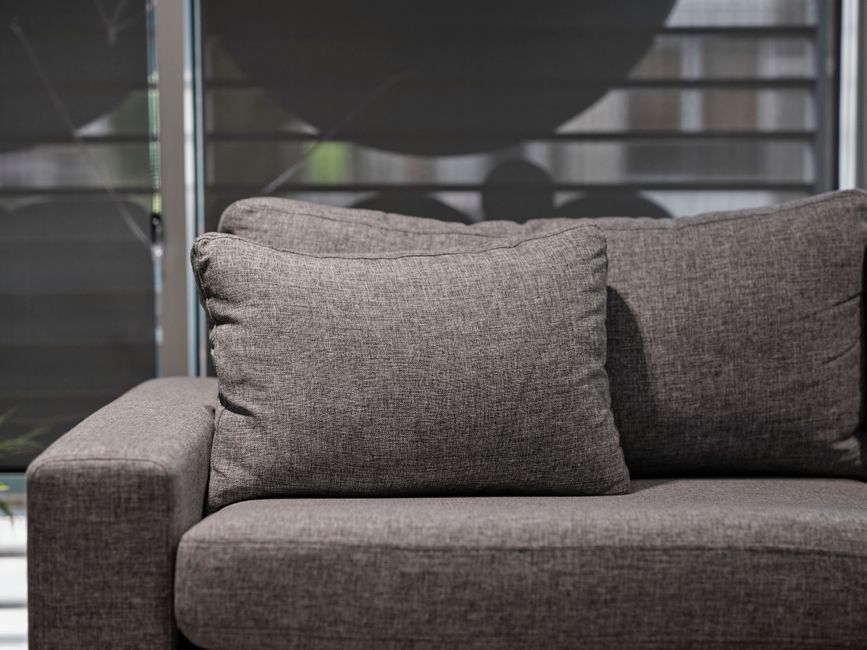 Detailed upholstery cleaning on a couch