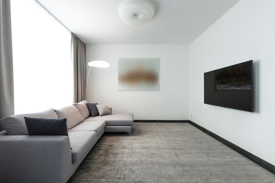 Clean and vibrant living room carpet after professional care